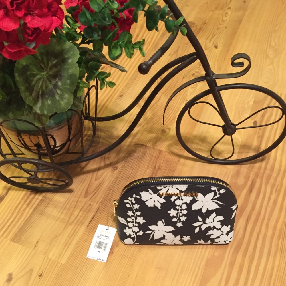 SOLD. NWT! Michael Kors Travel pouch. Orig. $98